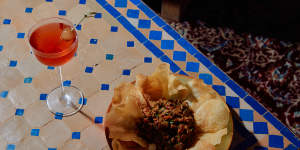 Grass-fed beef tartare,ras el hanout,eschalots,gaufrette potatoes at Kasbah.