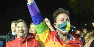 Spectators celebrate after Brisbane was announced the host of the 2032 Olympics.