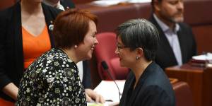 Kitching celebrates her maiden Senate speech with Penny Wong. 