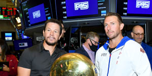 F45 founder Adam Gilchrist and major shareholder Mark Wahlberg on the floor of the New York Stock Exchange for the company’s IPO in July 2021.