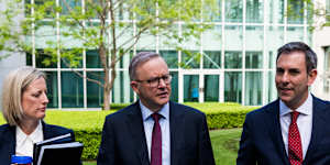 Finance Minister Katy Gallagher with Anthony Albanese and Jim Chalmers on budget day.