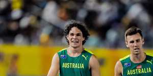 Calab Law[left] with Jacob Despard after helping Australia’s relay team qualify for the Paris Olympics.