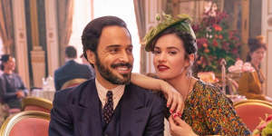Lily James as Linda Radlett and Assaad Bouab as Fabrice De Sauveterre in The Pursuit of Love.