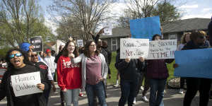 Protesters march in Kansas City,Missouri,on Sunday to draw attention to the shooting.