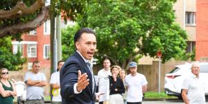 Ray White auctioneer James Hayashi prepared to sell the Randwick unit.