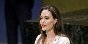 Angelina Jolie,addressing a meeting on UN peacekeeping in 2019,has created a fashion blueprint for Meghan with her new business Atelier Jolie.