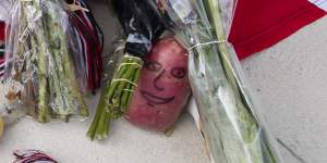 Some fans left potatoes among the collection of tributes.