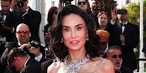 Demi Moore sports a shorter hairstyle and a dress from Self-Portrait at the Cannes Film Festival.