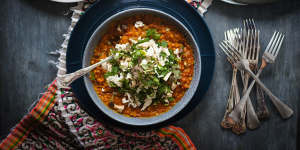 This butter chicken-inspired dhal can be made vegetarian - just swap the stock and hold the shredded chook (pictured as a topping).