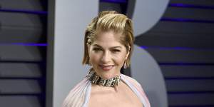 Selma Blair arrives at the Vanity Fair Oscar Party on Monday - with a cane custom-made by her friends. 