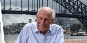 Ian Litchfield (95) pose for a portrait in front of the Harbour Bridge in Sydney.