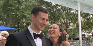 Alexander Fischer and Nina Oishi waiting to take part in the mass wedding.
