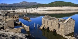 Frozen in time:Tourists flock to ghost village after dam empties