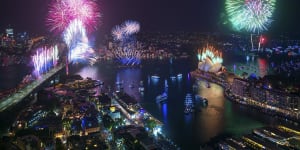New Year's Eve Fireworks Fireworks are seen over the Sydney Harbour Bridge and the Sydney Opera House from Grosvenor Place during New Yearâs Eve celebrations in Sydney,Tuesday December 31,2019. (City of Sydney/Daniel Tran) NO ARCHIVING