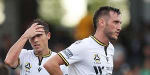 Mark Milligan and Aleksandar Susnjar after the Mariners'second goal condemned Macarthur FC to a first A-League defeat.