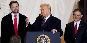 Donald Trump,flanked by J.D. Vance (left) and House Speaker Mike Johnson,gave a second,edgier speech to supporters in Emancipation Hall.