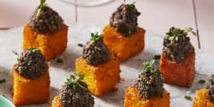 Polenta cubes topped with mushroom duxelle.