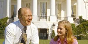 President Gerald Ford and his daughter,Susan look after both cats and dogs in the White House. Here,they are pictured with Liberty in 2974.