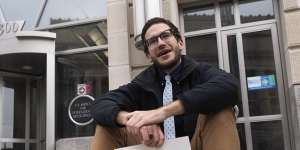 A USAID contract worker outside the agency’s office in Washington.