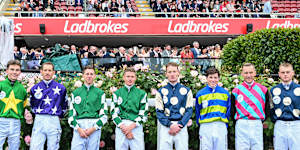 Ethan Brown,far right,before riding Light Infantry Man in this year’s Cox Plate.
