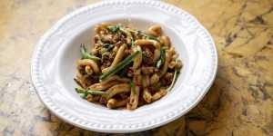 East meets West in a bowl of casarecce with Lao sausage,snake beans and garlic chives.