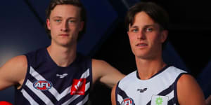 Jye Amiss and Neil Erasmus after being selected by Fremantle in the AFL national draft.
