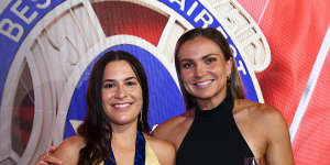 Ally Anderson (left) with Emily Bates after winning the AFLW best and fairest medal in 2022.