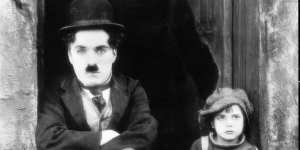Charlie Chaplin and Jackie Coogan in The Kid. 