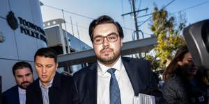 Bruce Lehrmann (right) outside the Magistrates Court in Toowoomba in June last year. 