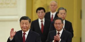 Mr Xi is followed by the other members of the Politburo Standing Committee on October 23.