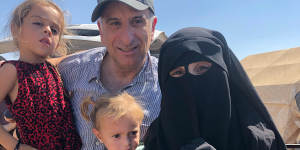 Kamalle Dabboussy with Mariam and her daughters Aisha,left,and Fatema,during his brief visit to the Al-Hawl refugee camp in Syria in 2019.