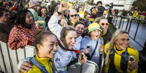 Dual Olympic bronze medallist Jemima Montag,Paralympic gold medallist Emily Petricola,and Australian Opal captain and bronze medallist Tess Madgen interact with excited fans at Melbourne Park.