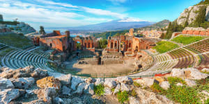 The ruins of an ancient Greek theatre in Taormina,Sicily. The number of Australians heading to Italy has surged post pandemic.