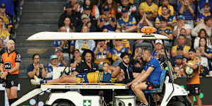 Bailey Simonsson is taken from the field after suffering a sickening ankle injury.