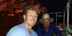 David Pocock and fellow activist farmer Rick Laird chained to a digger.