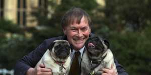 Conservative MP David Amess with his pugs,Lily and Boat.