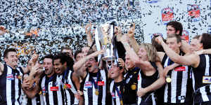 Collingwood celebrate the 2010 premiership,their most recent.