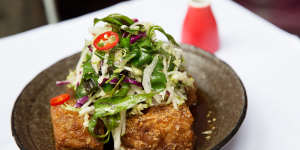 Red Spice Road's signature pork belly with chilli caramel,black vinegar and apple slaw.