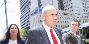 NAB chairman Ken Henry leaving the royal commission hearings in Melbourne late last year. 