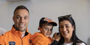  Wests Tigers halfback Luke Brooks with Reuben Guest and his mum Jordy.