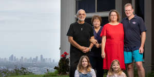 Leah Salo (second from right) with husband Tim,her parents Mark and Dixie,and kids Annalia (at left) and Savanna at their Gold Coast home,which incorporates shared and separate family spaces. 
