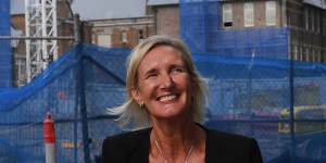 Principal of the new Inner Sydney High School,Robyn Matthews,with the school being built in the background.