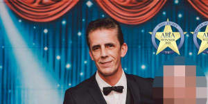 Bruce Harrison (left) receiving an award in recognition for his work as a wedding DJ and MC.