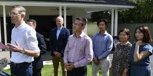 Premier Dominic Perrottet talks up his stamp duty proposal with Treasurer Matt Kean and Kogarah candidate Craig Chung on Sunday.