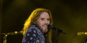 Tim Minchin is completely at ease about being Tim,ginger hair,mascara,bare feet and all.