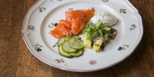 Salmon gravlax,creme fraiche and pickled cucumber.