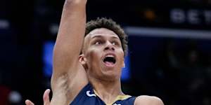 New Orleans Pelicans guard Dyson Daniels (11) passes around Sacramento Kings guard Kevin Huerter.