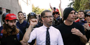 Proud Boys founder Gavin McInnes (centre).