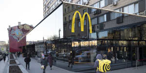 People walk past a McDonald’s restaurant in the main street in Moscow,in March,before they closed following sanctions due to the Russian invasion of Ukraine.