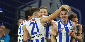 Cameron Zurhaar (second right) celebrates the match winner against Richmond.